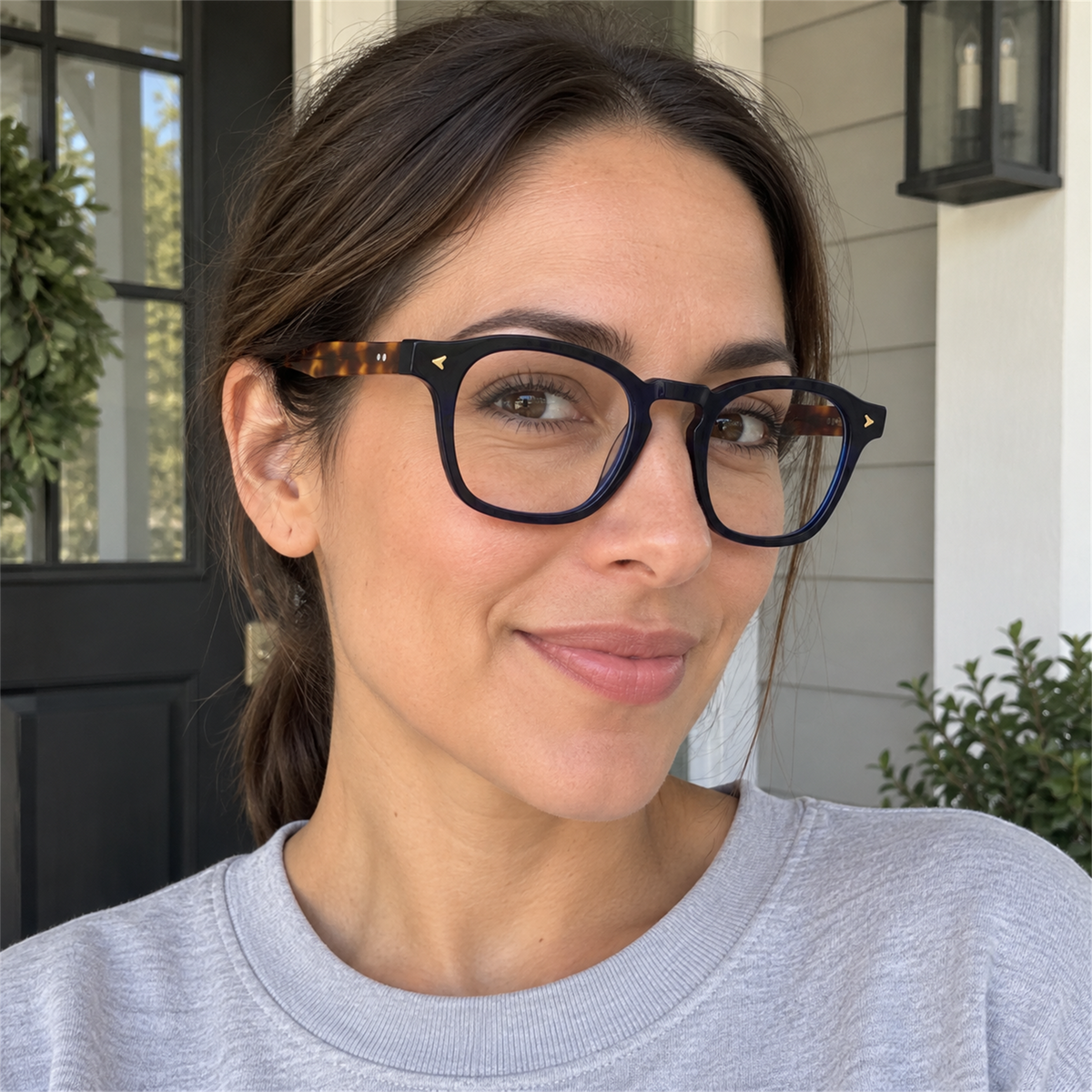 Sylvie navy blue acetate eyeglasses, lifestyle wearing photo