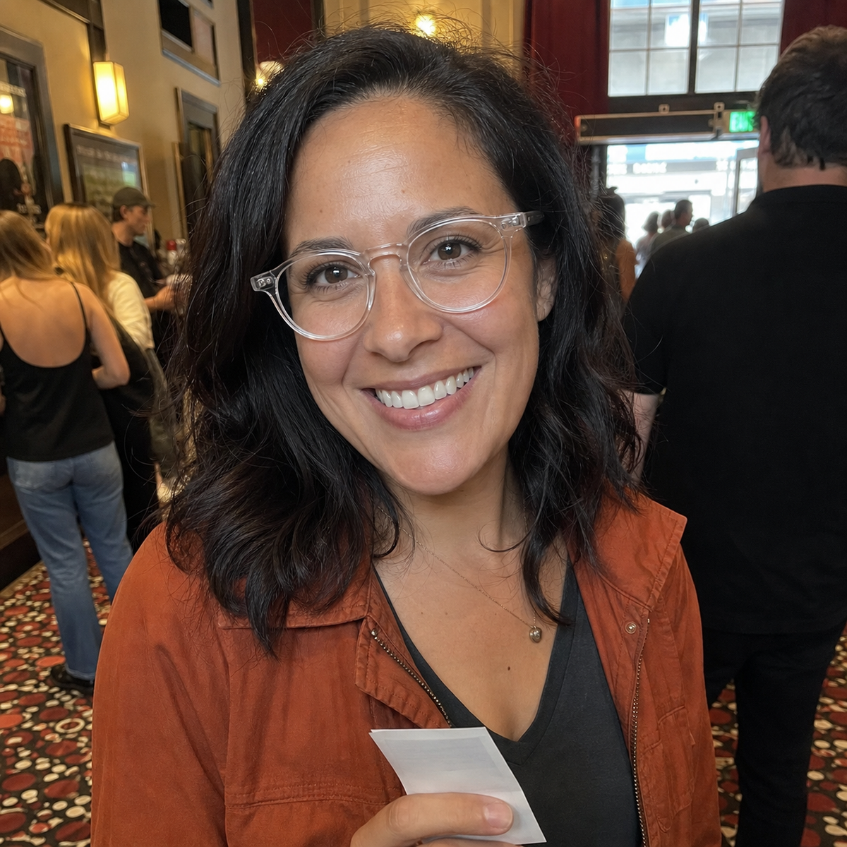 Camille crystal clear acetate glasses worn by a customer