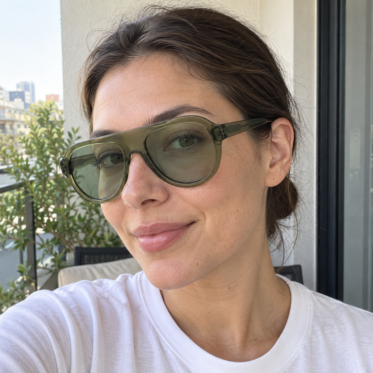 Harper crystal olive / green sunglasses, lifestyle view