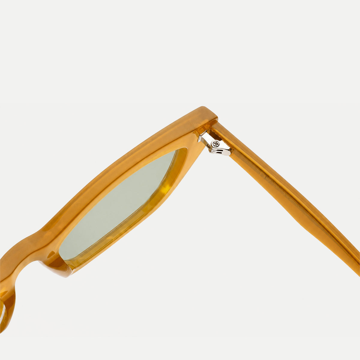 Lyra sunglasses - Crystal Amber / Light Green - hinge detail