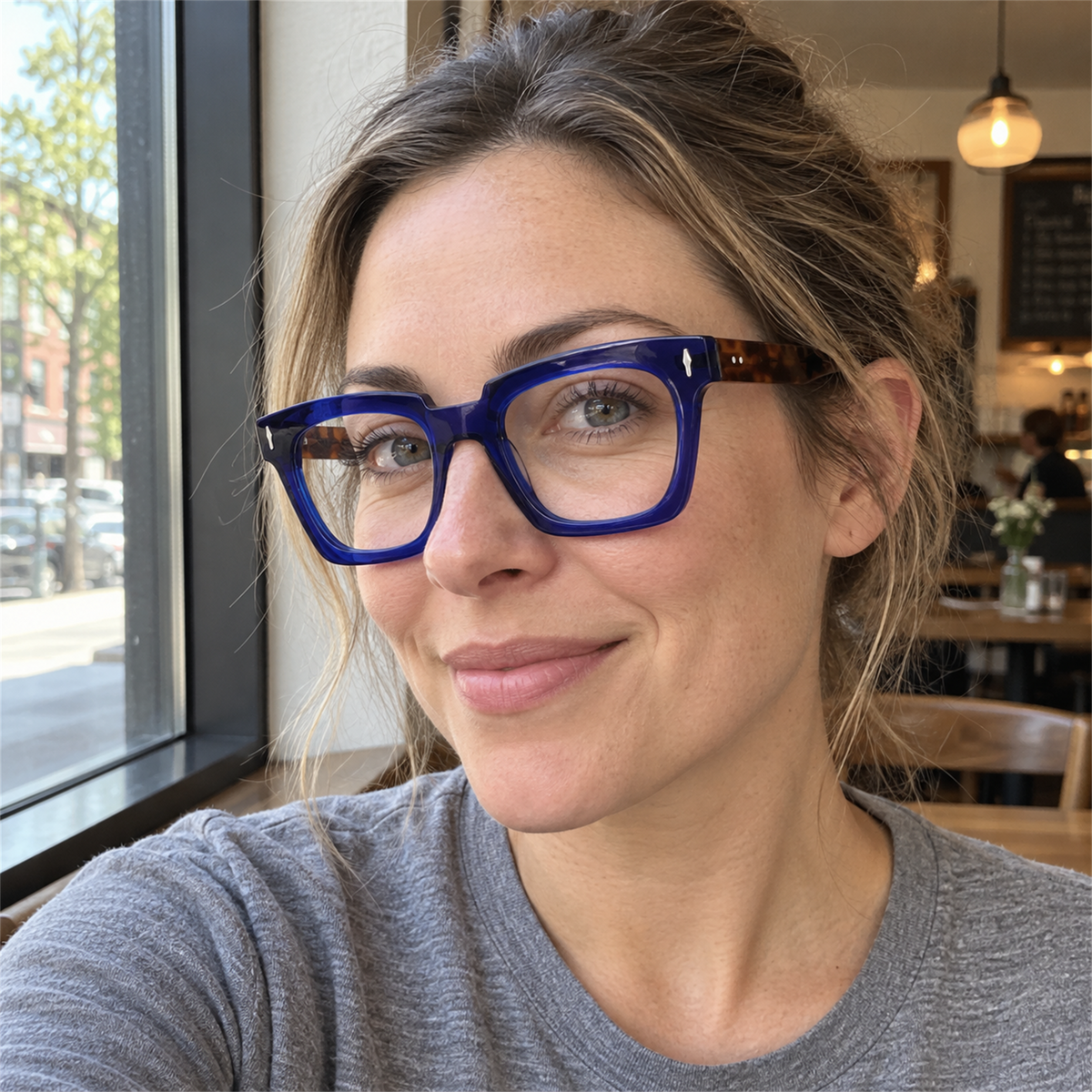 Greta navy blue acetate eyeglasses, lifestyle wearing photo