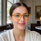 Hazel honey amber acetate glasses worn by a customer