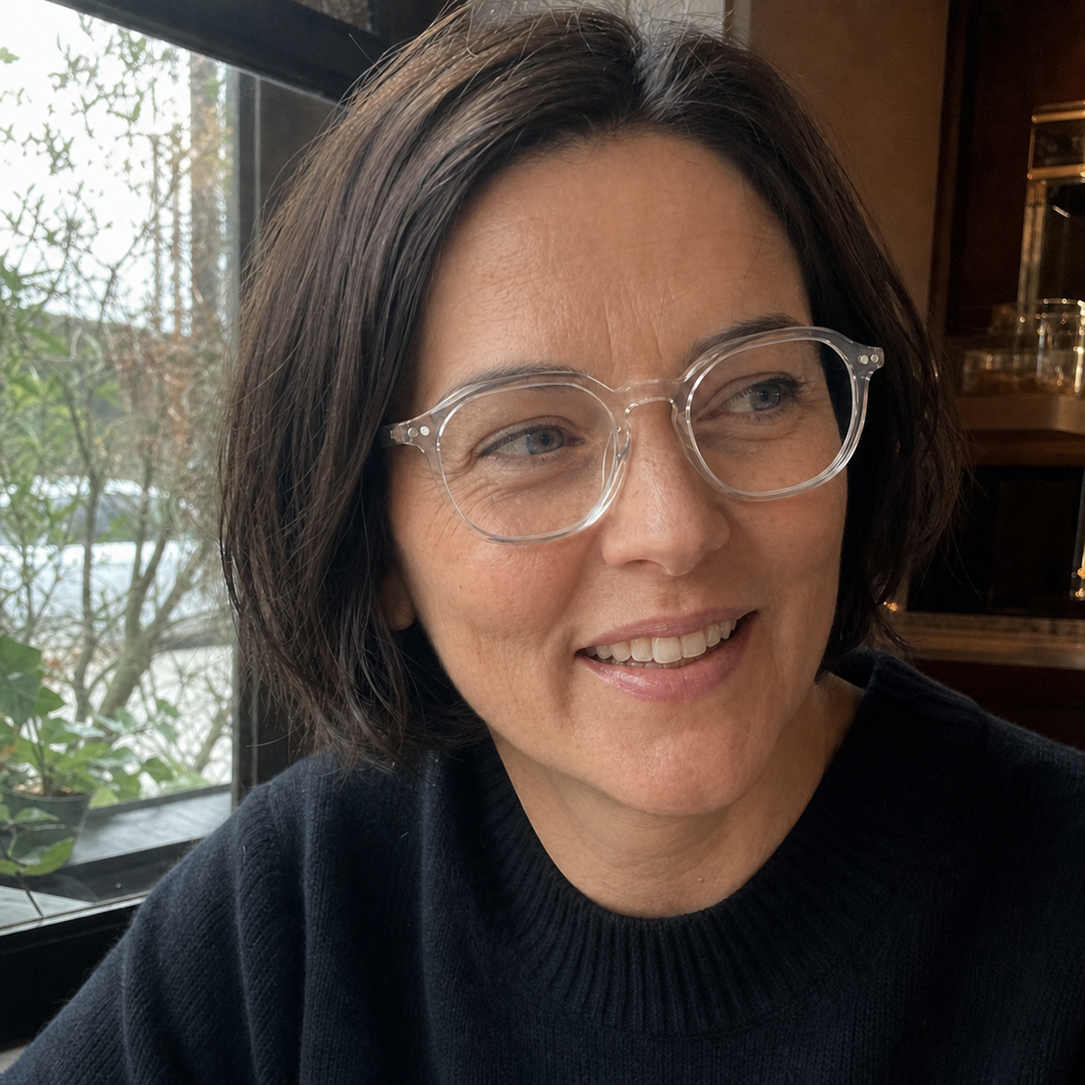 Hazel crystal clear acetate glasses worn by a customer