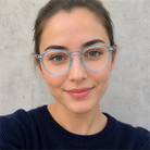 Camille light blue acetate glasses worn by a customer