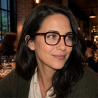 Eleanor burgundy acetate glasses worn by a customer
