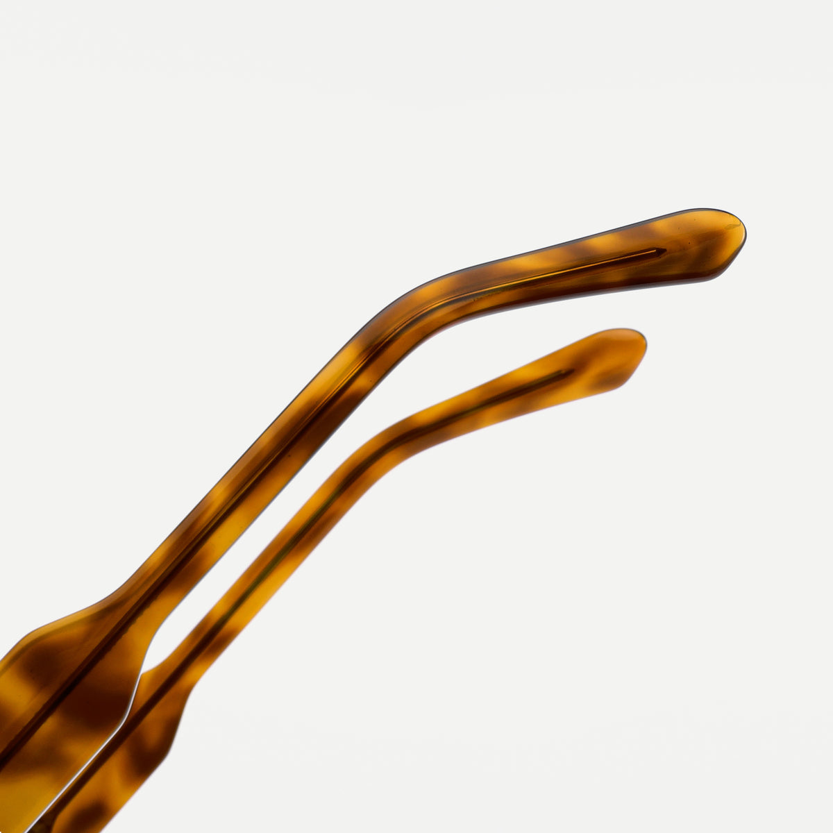 Rowan sunglasses - Amber Tortoise / Green - temple detail