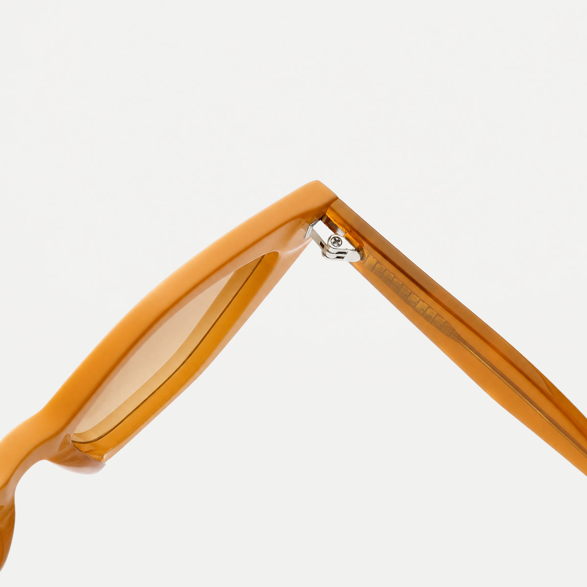 Vega sunglasses - Crystal Amber / Peach - hinge detail