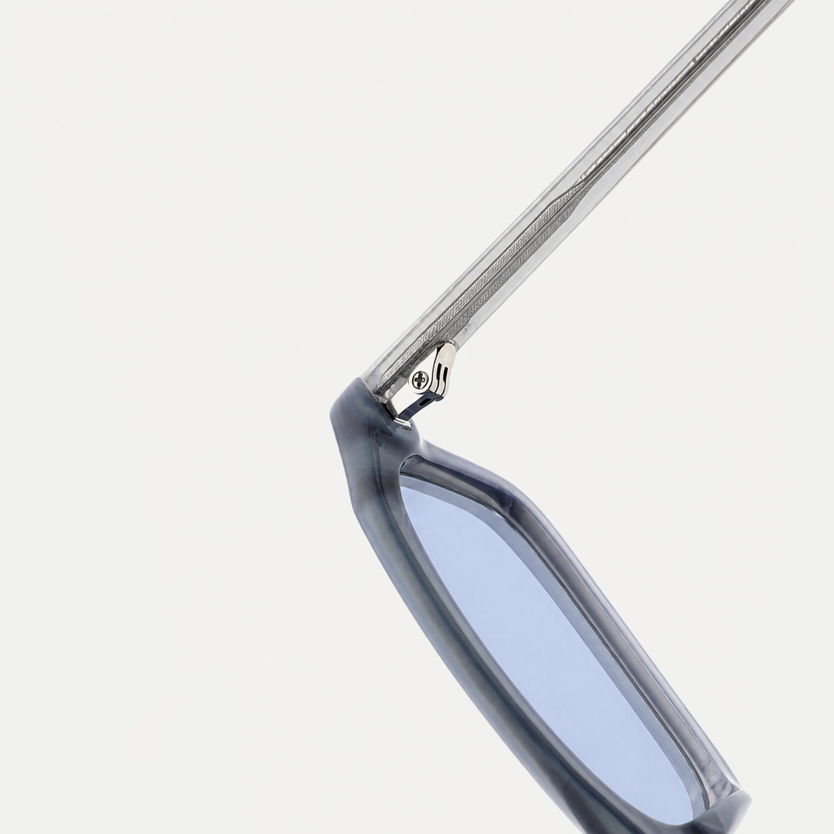 Cleo sunglasses - Crystal Smoke / Ice Blue - hinge detail