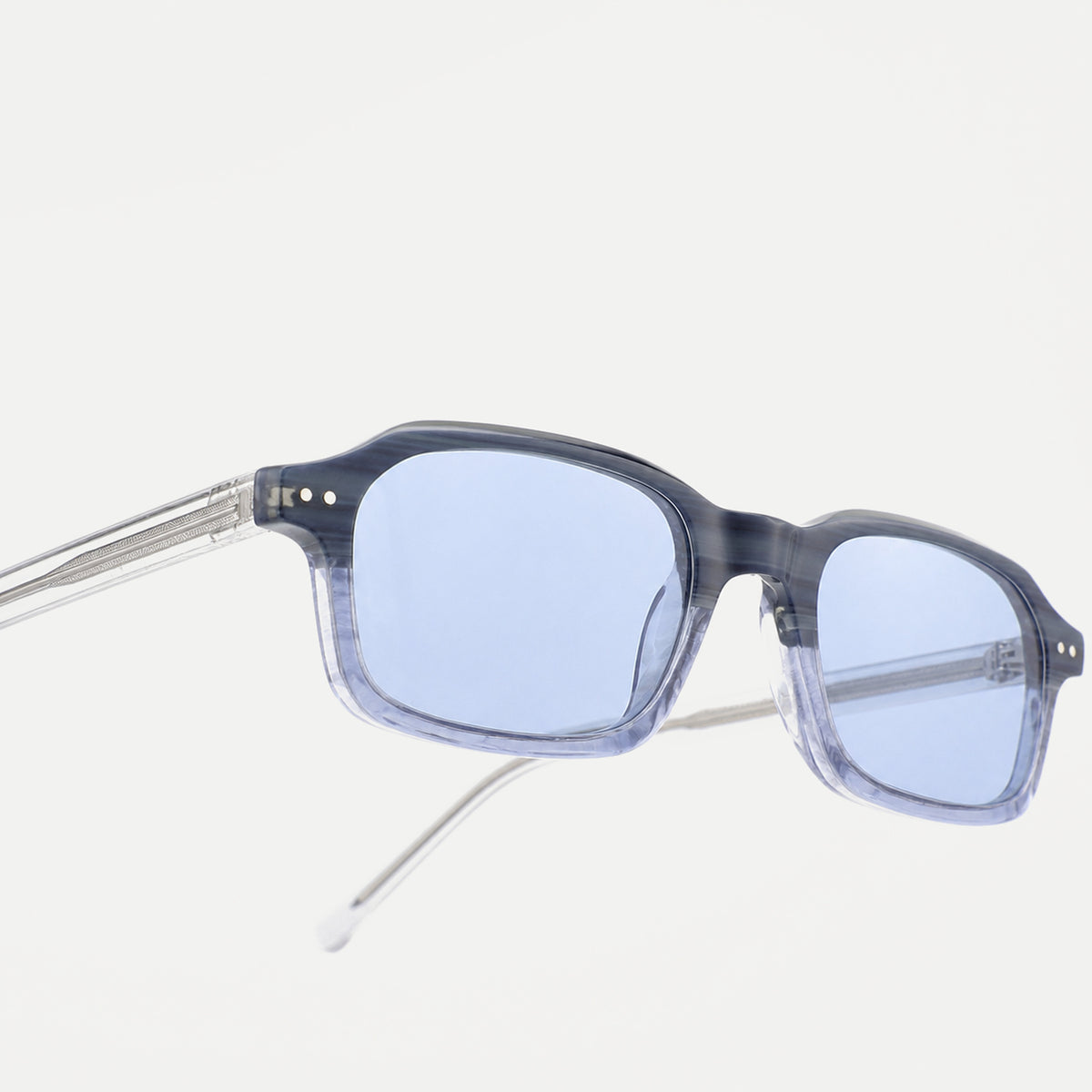 Cleo sunglasses - Crystal Smoke / Ice Blue - temple detail